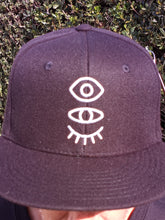 Load image into Gallery viewer, Black Snap-Back W/ Silver Eyevate Eyecon Emboidery
