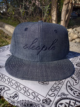 Load image into Gallery viewer, Denim Snap-Back W/ Navy Blue sleople Embroidery
