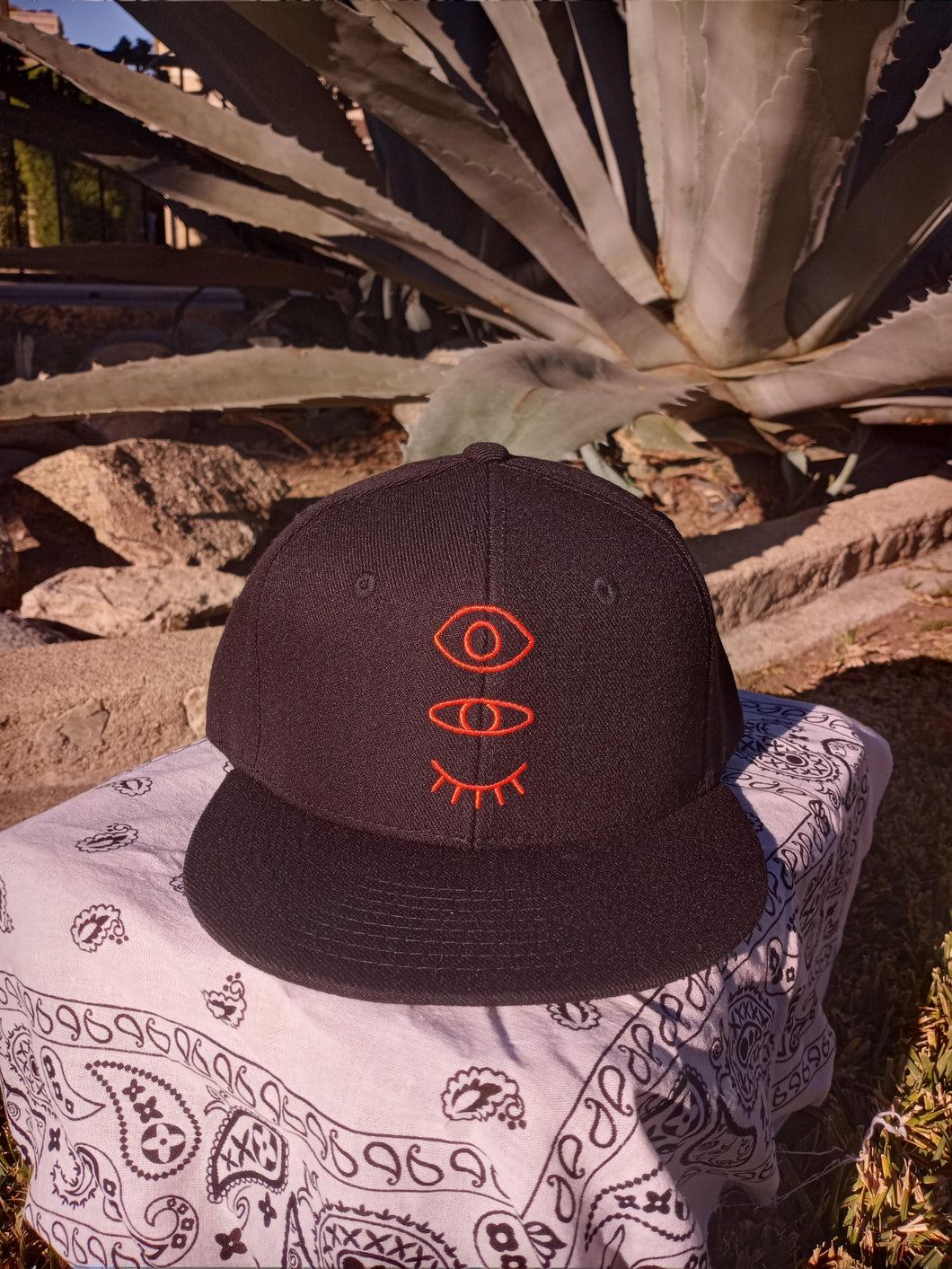 Black Snap-Back W/ Burnt Orange Eyevate Eyecon Embroidery